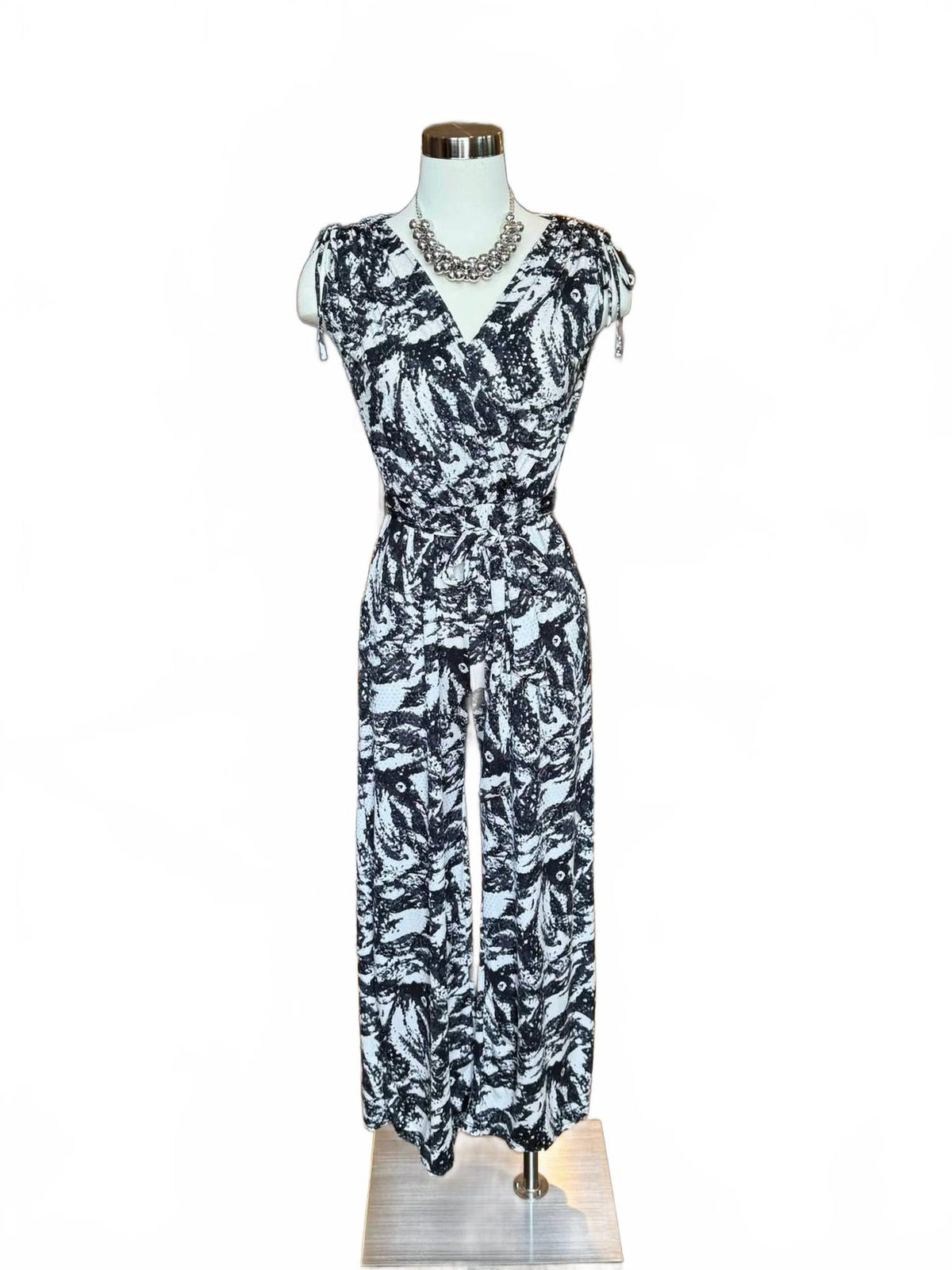 Printed Surplice Jumpsuit With Belt In Black Print