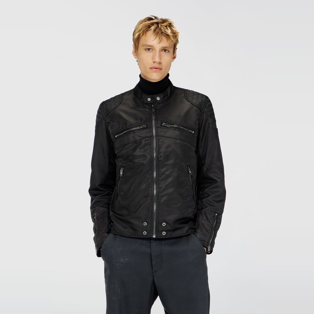 Nylon jacket with quilted shoulders and zip pockets